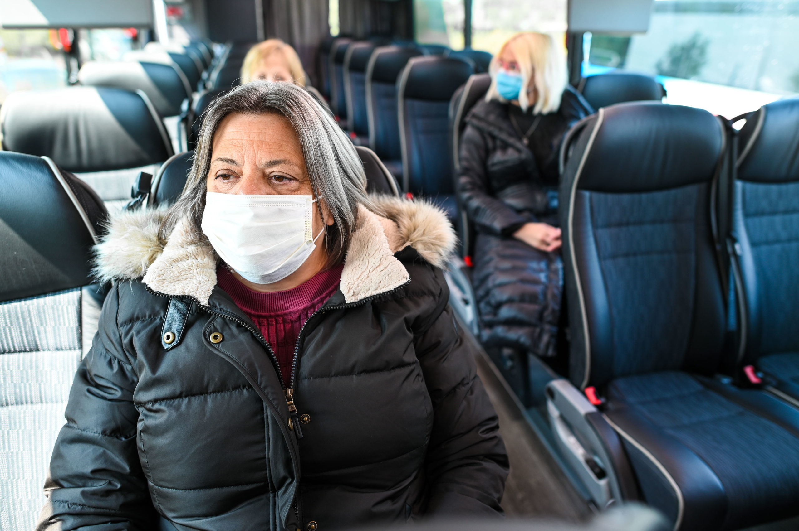 Passenger Wearing a Mask on Bus
